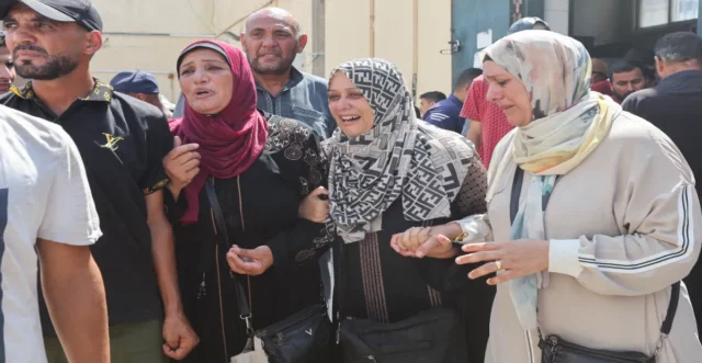 Palestinians mourning the loss of their loved ones