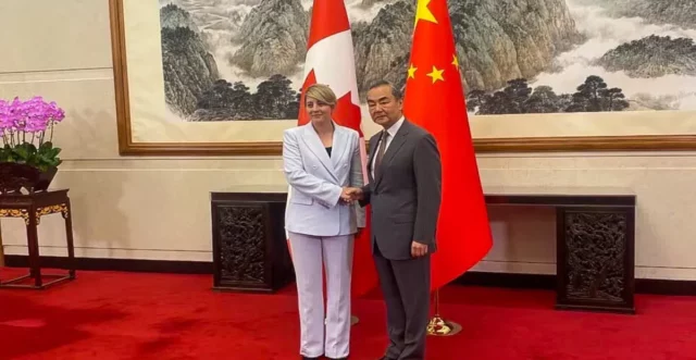 Canadian Foreign Minister Melanie Joly with her Chinese counterpart, Wang Yi