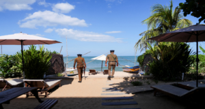 Israel Issues Travel Warning To Parts Of Sri Lanka Over Terrorism Threat Policemen guard the beachside tourist hotel in Arugam Bay in Sri Lanka