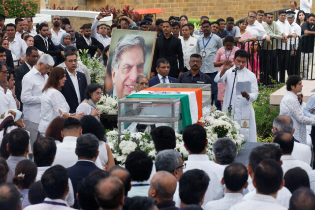 A priest prays during a final viewing for the public to pay their respects to the former chairman of Tata Group Ratan Tata, in Mumbai Funeral Of Ratan Tata