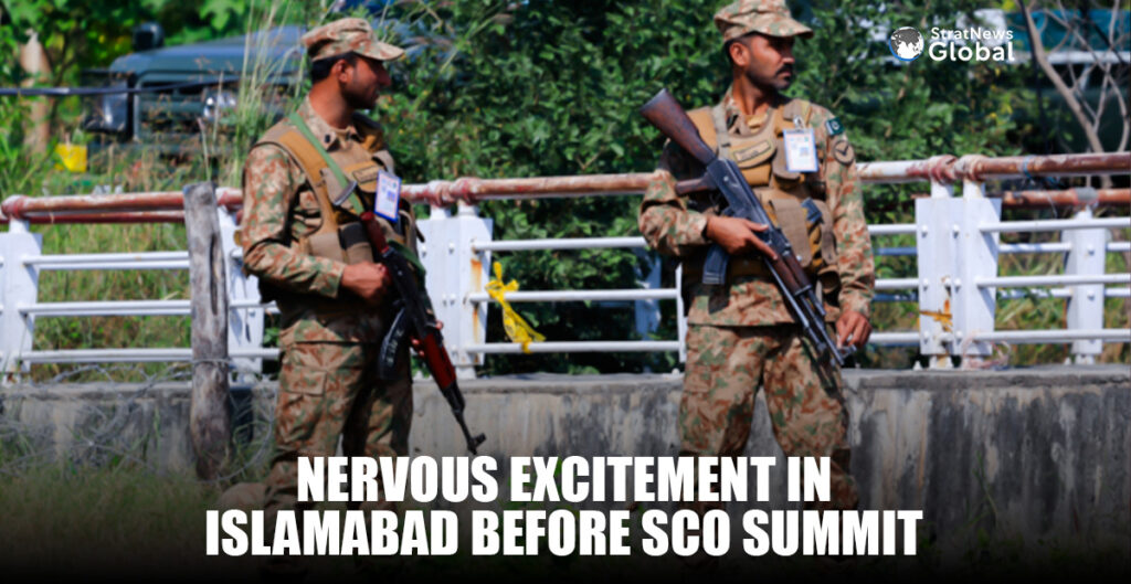 Pakistan Army soldiers stand guard at the Red Zone area
