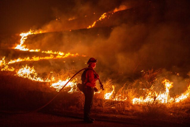 Firefighters and aircraft battle the Hughes Fire near Santa Clarita Hughes Fire Los Angeles