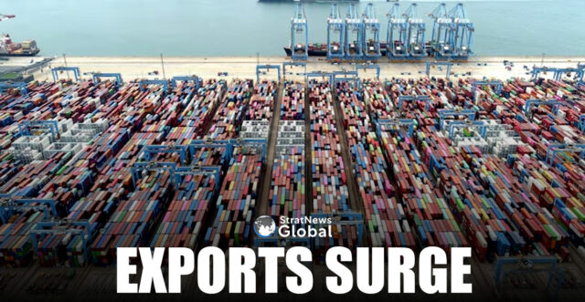 An aerial view shows containers and cargo vessels at the Qingdao port in Shandong province, China May 9, 2022. China Daily via REUTERS/File Photo