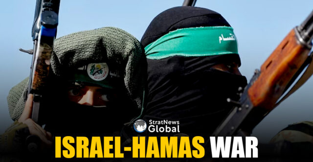 Palestinian fighters from the armed wing of Hamas take part in a military parade to mark the anniversary of the 2014 war with Israel, in the central Gaza Strip, July 19, 2023. REUTERS/Ibraheem Abu Mustafa/File Photo