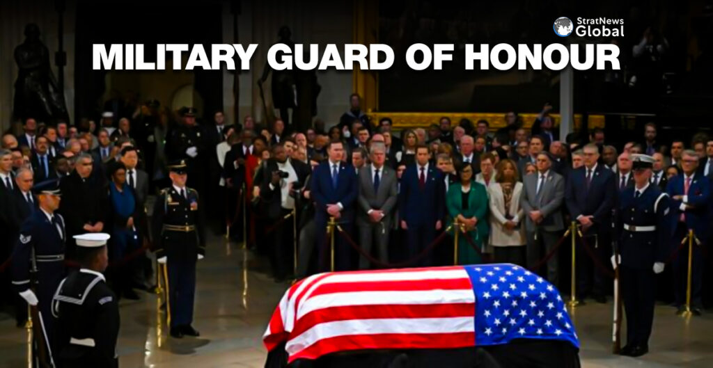 A military guard of honor stands next to the flag-draped casket of former US President Jimmy Carter at the US Capitol Rotunda