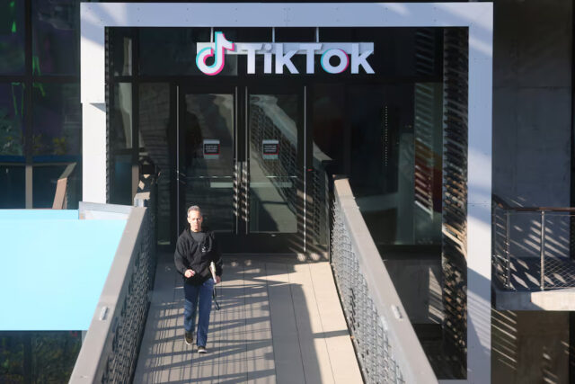 A man leaves the U.S. headquarters of the social media company TikTok in Culver City, California, U.S. January 17, 2025. REUTERS/David Swanson