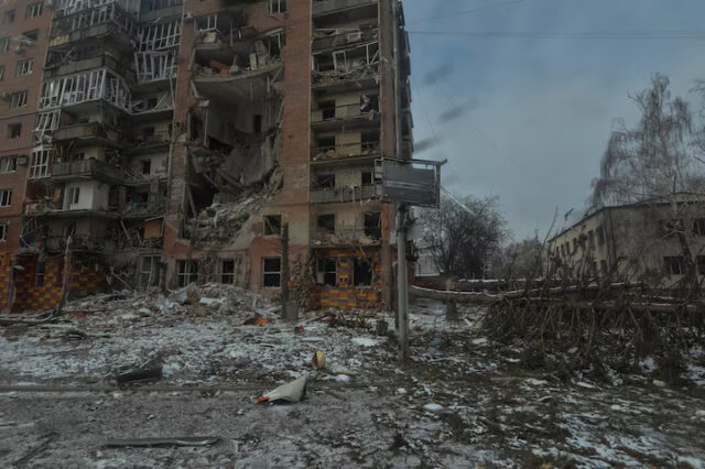 5XBPQQ7XRBOZVMXTO53USFMJJQ A view shows an apartment building damaged by Russian military strikes, amid Russia's attack on Ukraine, in this picture taken from the window of an armoured vehicle, in Pokrovsk, Donetsk region, Ukraine February 7, 2025. REUTERS/Oleksandr Klymenko/File Photo