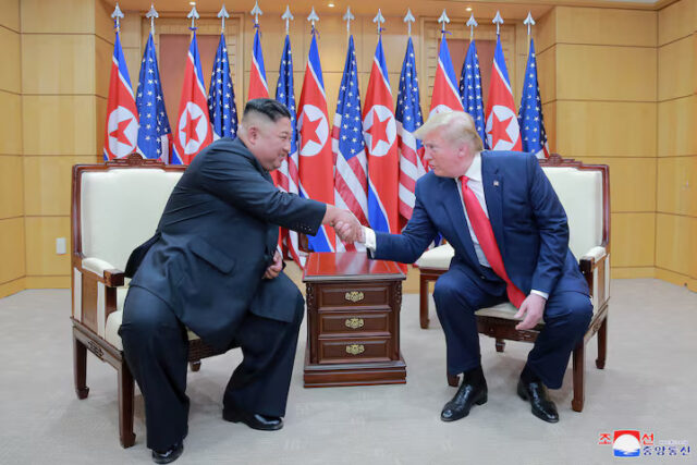 EETH2BPCGBOSBH5HOZRUZEOFBU U.S. President Donald Trump and North Korean leader Kim Jong Un shake hands during a meeting at the demilitarized zone (DMZ) separating the two Koreas, in Panmunjom, South Korea, June 30, 2019. KCNA via REUTERS/File Photo