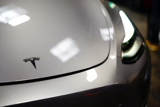 The Tesla logo is seen on a car at the Paris Games Week (PGW), a trade fair for video games in Paris, France, October 27, 2024. REUTERS/Sarah Meyssonnier/File Photo