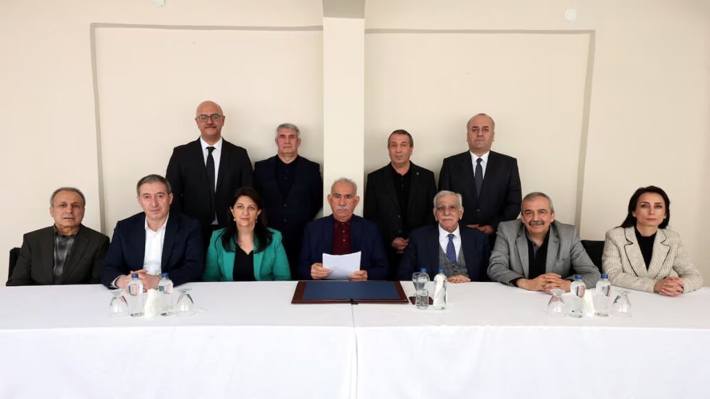 Abdullah Ocalan, the jailed leader of the outlawed Kurdish militant group PKK, is seen with politicians and lawmakers of the pro-Kurdish Peoples' Equality and Democracy Party (DEM Party) Ahmet Turk, Pervin Buldan, Sirri Sureyya Onder, Tulay Hatimogullari, Tuncer Bakirhan, Cengiz Cicek and Faik Ozgur Erol, in Imrali Island prison, in Marmara Sea, in Turkey, February 27, 2025. Peoples' Equality and Democracy Party/Handout via REUTERS