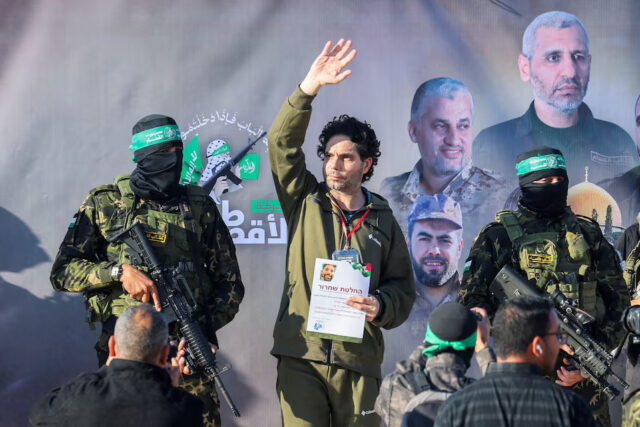 KD2BWN5QMNMY3FLD3TBTKUMAVU Ofer Kalderon, a hostage held in Gaza since the deadly October 7, 2023 attack, is released by Palestinian Hamas militants as part of a ceasefire and a hostages-prisoners swap deal between Hamas and Israel, in Khan Younis in the southern Gaza Strip, February 1, 2025. REUTERS/Ramadan Abed