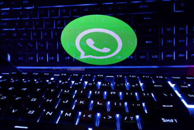 ORJAL4DYNFOR3K2HJT2YITAO6Q A keyboard is placed in front of a displayed WhatsApp logo in this illustration taken February 21, 2023. REUTERS/Dado Ruvic/Illustration/File Photo