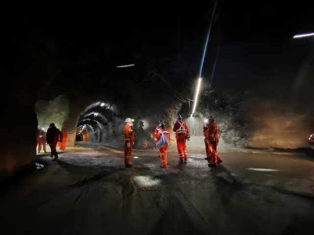 OS27C3F4XBNRFCOQYXXQII7HN4 An industry tour group walks inside the Codelco El Teniente copper mine, the world's largest underground copper mine near Machali area, Rancagua, Chile October 15, 2020. REUTERS/Fabian Cambero/File Photo