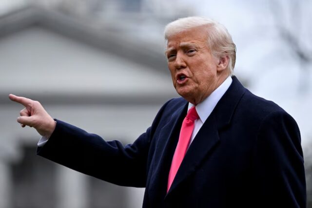 U.S. President Donald Trump speaks to members of the media as he returns to the White House from National Harbor following his address to the Conservative Political Action Conference (CPAC) annual meeting, on the South Lawn in Washington, D.C., U.S., February 22, 2025. REUTERS/Craig Hudson