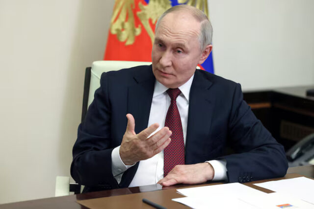 RZMYAKKCKBLFBHWDTCT4CGQ3H4 Russian President Vladimir Putin speaks with state TV Kremlin correspondent Pavel Zarubin at his residence outside Moscow, Russia, February 24, 2025. Sputnik/Mikhail Metzel/Pool via REUTERS