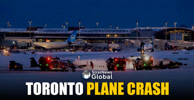 Emergency responders operate around a plane on a runway after a plane crash at Toronto Pearson International Airport in Mississauga, Ontario, Canada February 17, 2025. REUTERS/Cole Burston