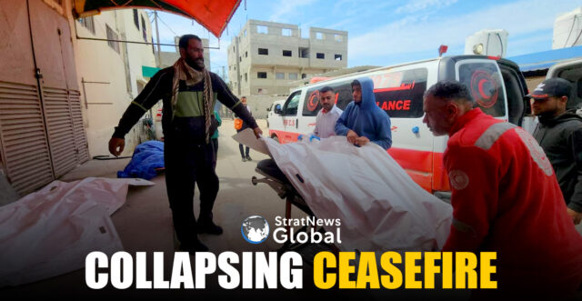 Mourners and a paramedic move the body of a Palestinian, killed in an Israeli strike, according to medics, at Al-Aqsa Martyrs hospital in Deir Al-Balah in the central Gaza Strip March 17, 2025. REUTERS/Osama Shareef