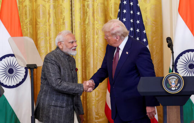 J5IGJDZI6NLWREJCKGTBCJ474M U.S. President Donald Trump and Indian Prime Minister Narendra Modi shake hands as they attend a joint press conference at the White House in Washington, D.C., U.S., February 13, 2025. REUTERS/Kevin Lamarque/File Photo