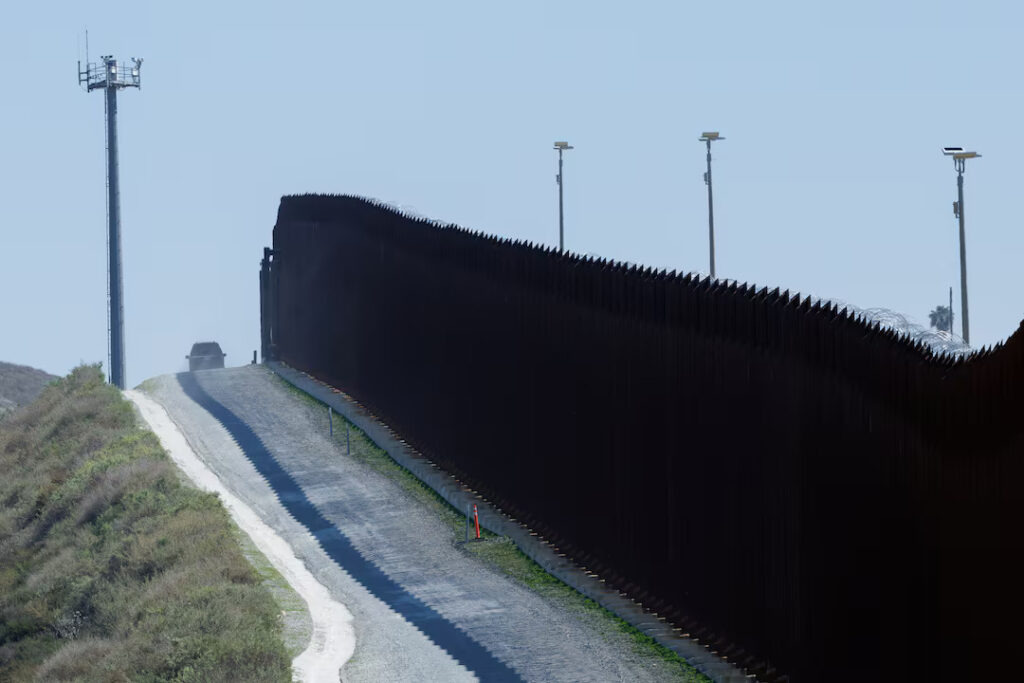Electronic monitoring equipment is shown along the border wall between Mexico and the United States in San Diego, California, U.S., March 21, 2025. REUTERS/Mike Blake