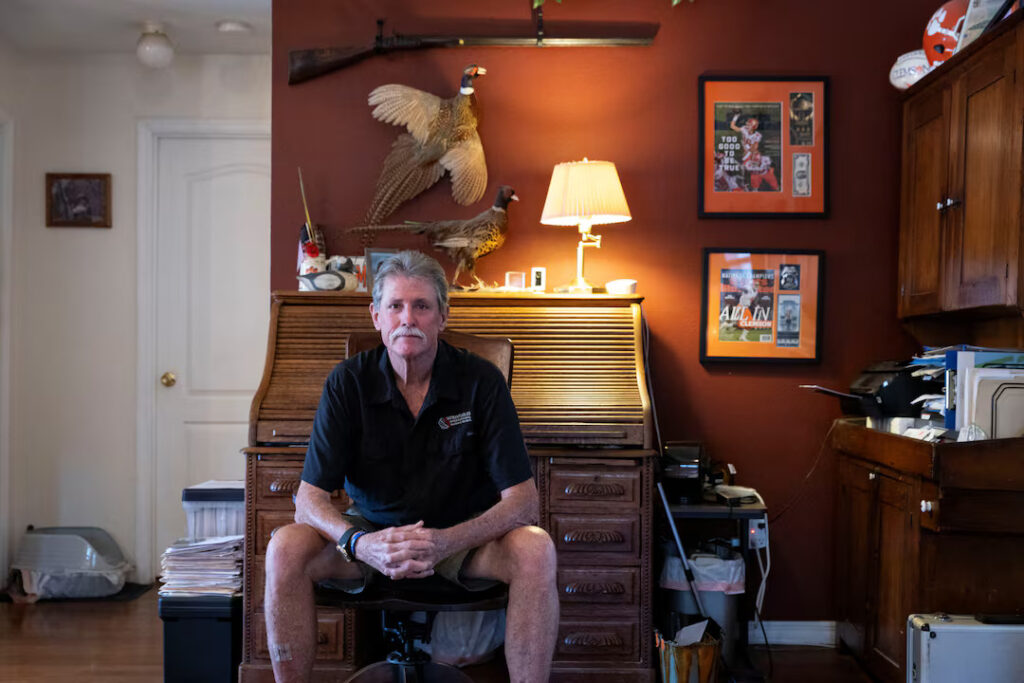 Steve Egan, owner of a custom promotional items business, poses for a portrait during an interview with Reuters in Brandon, Florida, U.S. April 22, 2025. REUTERS/Marco Bello