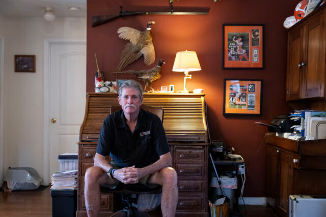 L6YFJ3Y6RFKBJBNIYDTGSQGMZI Steve Egan, owner of a custom promotional items business, poses for a portrait during an interview with Reuters in Brandon, Florida, U.S. April 22, 2025. REUTERS/Marco Bello
