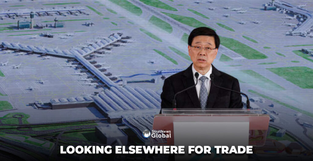 Hong Kong's Chief Executive John Lee speaks during the opening ceremony to the official launch of its third runway, in Hong Kong International Airport, in Hong Kong, China November 28, 2024. REUTERS/Tyrone Siu/File Photo
