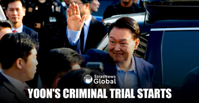 Ousted former South Korean President Yoon Suk Yeol waves to his supporters as he moves out of the presidential residence in Seoul, South Korea, April 11, 2025. Yonhap/via REUTERS/File Photo