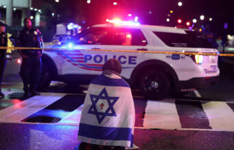 Emergency personnel work at the site where, according to the U.S. Homeland Security Secretary, two Israeli embassy staff were shot dead near the Capital Jewish Museum in Washington, D.C., U.S. May 21, 2025. REUTERS/Jonathan Ernst TPX IMAGES OF THE DAY