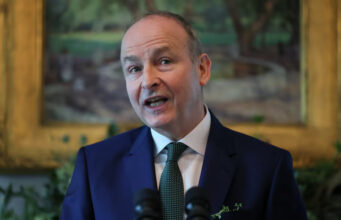 Ireland's Taoiseach (Prime Minister) Micheal Martin delivers remarks during his visit at U.S. Vice President JD Vance's residence for breakfast, ahead of St. Patrick's Day, in Washington, D.C., U.S., March 12, 2025. REUTERS/Leah Millis/File Photo