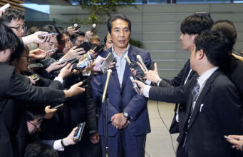 Japan's Agriculture, Forestry and Fisheries Minister Taku Eto speaks to the media after a meeting with Prime Minister Shigeru Ishiba over his controversial comments about receiving rice from supporters, at Ishiba's official residence in Tokyo, Japan May 19, 2025, in this photo released by Kyodo. Kyodo/via REUTERS