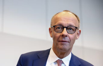 Incoming German Chancellor Friedrich Merz of CDU looks on, ahead of a Bundestag CDU/CSU/SPD coalition meeting, where a new chair will be elected, in Berlin, Germany, May 5, 2025. REUTERS/Liesa Johannssen/File Photo