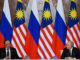 Russian President Vladimir Putin and Malaysian Prime Minister Anwar Ibrahim deliver a joint media statement following their talks at the Kremlin in Moscow, Russia May 14, 2025. Alexander Nemenov/Pool via REUTERS