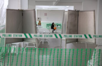 A polling station is set up at a housing estate void deck, ahead of the general election in Singapore May 1, 2025. REUTERS/Edgar Su