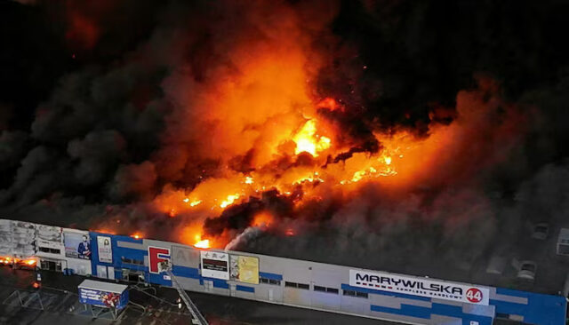 Drone view of the Marywilska 44 shopping centre burning during a massive fire in Warsaw, Poland, May 12, 2024. Dariusz Borowicz/Agencja Wyborcza.pl via REUTERS/File Photo