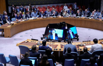 IAEA Director General Rafael Grossi seen on screen addresses delegates during a meeting of the United Nations Security Council, following Israel’s attack on Iran, at UN headquarters in New York City, US, June 13, 2025. REUTERS/Eduardo Munoz