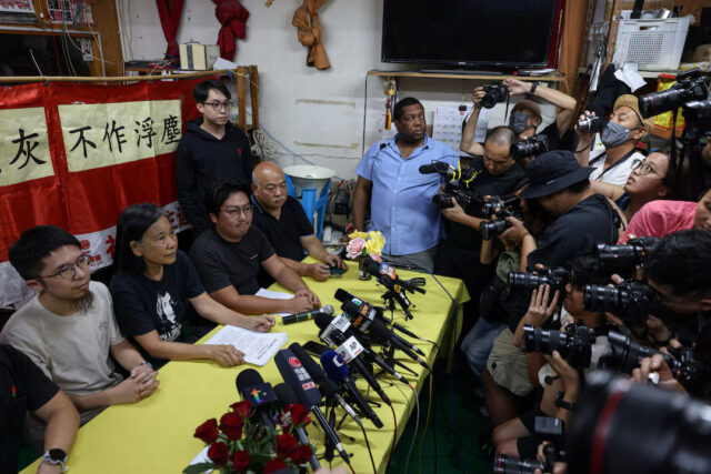 UOWNU4CRT5IZBI73QKL4JQRWCQ Reporters photograph the press conference where Chan Po-ying, chair of Hong Kong’s League of Social Democrats, along with party members Jimmy Sham, Raphael Wong, and Figo Chan, announces the party’s dissolution amid China’s national security law, in Hong Kong, China, June 29, 2025. REUTERS/Tyrone Siu