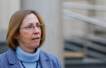 US Ambassador to Russia Lynne Tracy speaks with journalists outside a court building after a hearing to consider extending detention of Wall Street Journal reporter Evan Gershkovich in Moscow, Russia, March 26, 2024. REUTERS/Evgenia Novozhenina/File Photo