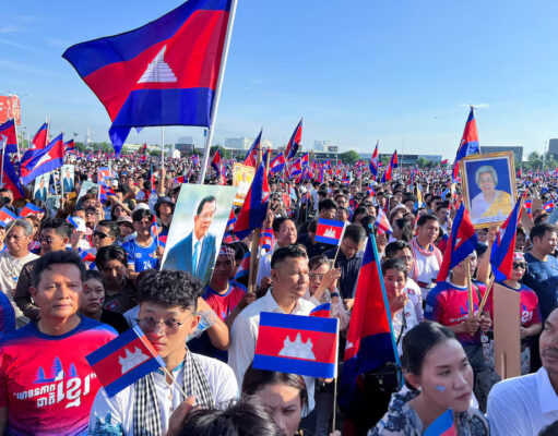 Cambodians hold national flags and a portrait of Cambodia's Hun Sen as they attend a "Solidarity March" to support the government's decision to deploy the army at the disputed Thailand-Cambodia border, following a clash at the border on May 28, 2025, in Phnom Penh, Cambodia, June 18, 2025. REUTERS/Chantha Lach