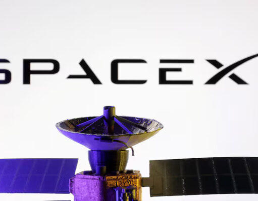 SpaceX logo and miniature satellite model are seen in this illustration taken, March 10, 2025. REUTERS/Dado Ruvic/Illustration/File Photo