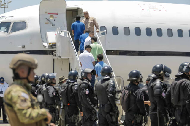 NJNB4BYETNLCXAN66A6RPNTSOA Venezuelan detainees are shown being sent home in a prison exchange for Americans held in Venezuela, according to El Salvador President Nayib Bukele, at El Salvador International Airport, in San Luis Talpa, El Salvador, in this handout picture obtained by Reuters on July 18, 2025. El Salvador Government/Handout via REUTERS