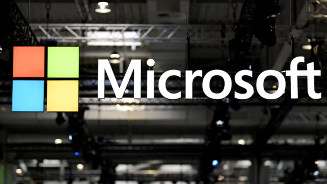 XXG5ABOWUBMYNKL2MBP7YD33QU A view shows the Microsoft logo on the day of the Hannover Messe, one of the world's largest industrial trade fairs with this year's partner country being Canada, as both Canada and the European Union face new U.S. tariffs, in Hanover, Germany, March 31, 2025. REUTERS/Fabian Bimmer/File Photo
