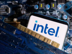 Bessent Confirms Intel Investment Talks; Equity-For-Aid Model In Focus A smartphone with a displayed Intel logo is placed on a computer motherboard in this illustration taken March 6, 2023. REUTERS/Dado Ruvic/Illustration/File Photo