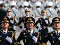 Putin, Kim To Attend Beijing Military Parade In Defiant Display Against Western Pressure