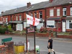 England Flags Stir Pride And Concerns Amid Anti-Migrant Protests