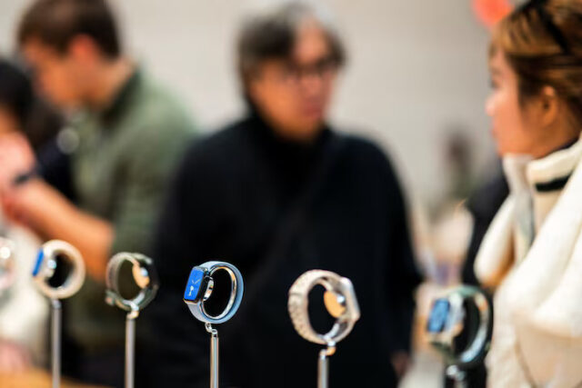 FYJVKOGL2ZP3FPYWFJZHQZJ2QY Apple smartwatches are displayed as customers wait to buy them at the Apple store in New York, US