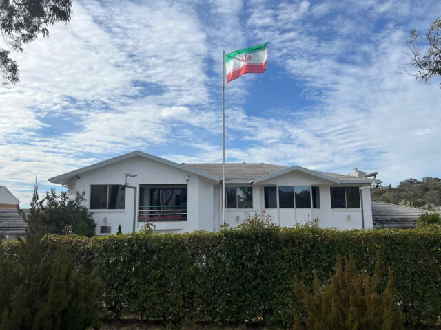 L5ELJO7SPROF7PGRCDCZVNL3C4 A flag flutters above the Embassy of the Islamic Republic of Iran in Canberra, Australia, August 26, 2025. Australia’s Prime Minister Anthony Albanese has expelled Iran’s ambassador, accusing Iran of orchestrating at least two antisemitic attacks on Australian soil. REUTERS/Peter Hobson