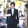 South Korea's former first lady Kim Keon Hee, wife of impeached former president Yoon Suk Yeol, arrives at a court to attend a hearing to review her arrest warrant requested by special prosecutors at the Seoul Central District Court, in Seoul, South Korea August 12, 2025. JUNG YEON-JE/Pool via REUTERS