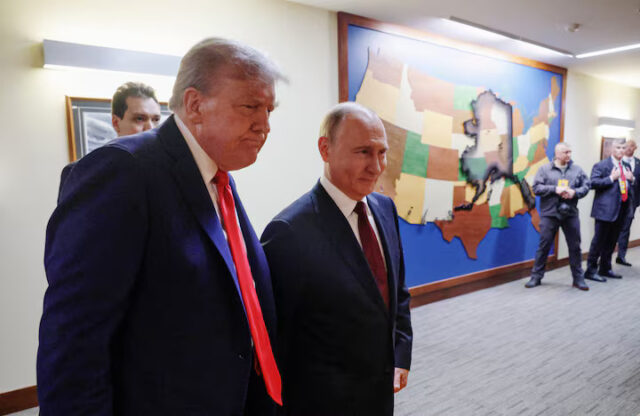 U4TWW4Z6HVOOVFUZ3CW62SPW7U U.S. President Donald Trump and Russian President Vladimir Putin walk to a joint news conference following their meeting at Joint Base Elmendorf-Richardson in Anchorage, Alaska, U.S., August 15, 2025. Sputnik/Gavriil Grigorov/Pool via REUTERS/File Photo