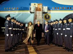US President Donald Trump Arrives In UK For Second State Visit U.S. President Donald Trump walks with first lady Melania Trump and Viscount Henry Hood upon arrival at London Stansted Airport for a state visit to Britain, near London, Britain, September 16, 2025. REUTERS/Kevin Lamarque