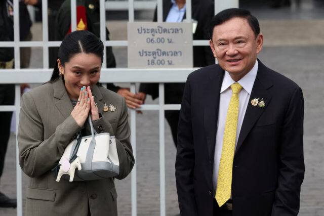 6R2EHBUTDFO25F4VYSDLPK2JSE Former Thai Prime Minister Thaksin Shinawatra and former Thai Prime Minister Paetongtarn Shinawatra arrive at the Supreme Court ahead of a verdict on the legality of Thaksin's six-month hospital stay before he was granted a parole, in Bangkok, Thailand, September 9, 2025. REUTERS/Chalinee Thirasupa